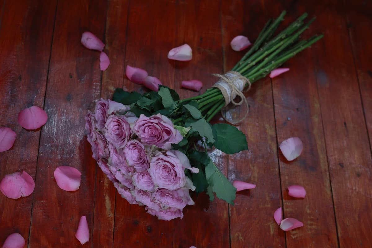 Beautiful pink roses hand-tied with rustic twine